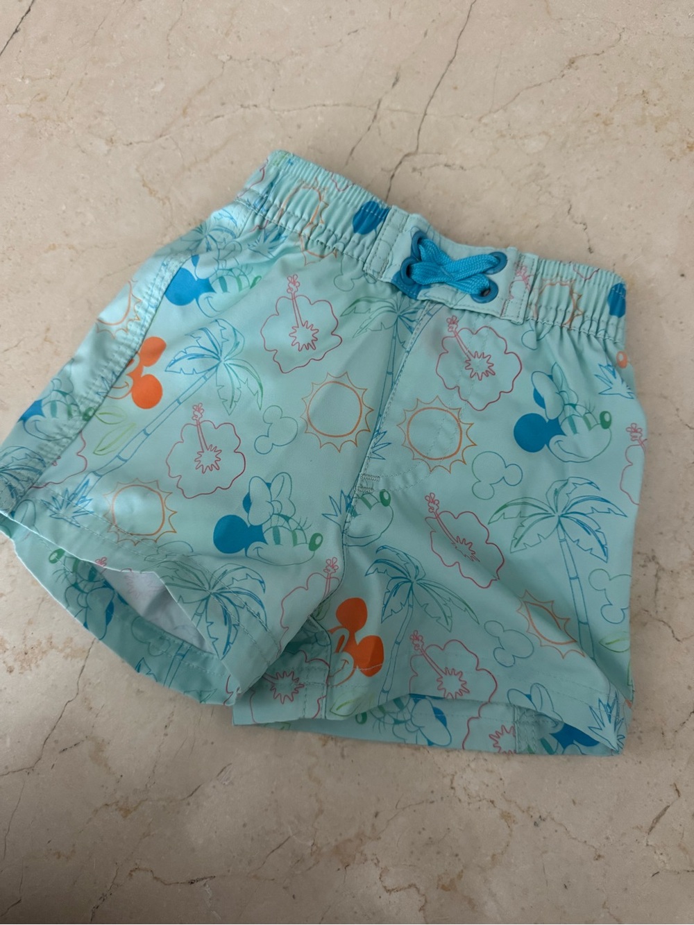 Disney Light Blue Swim Shorts with Orange and Blue Accents